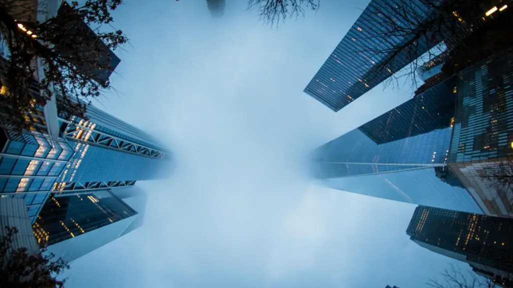 Dramatic view of misty skyscrapers disappearing into the fog in New York City, USA.